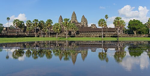 Angkor Wat reflected in its moat at dawn
