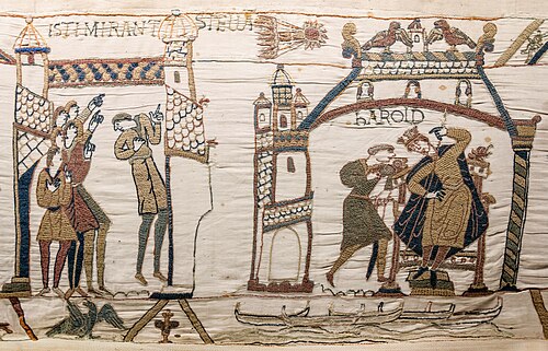 Bayeux Tapestry panel showing men pointing at Halley Comet above a seated Harold